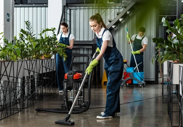 Clean Start team members preparing cleaning supplies.