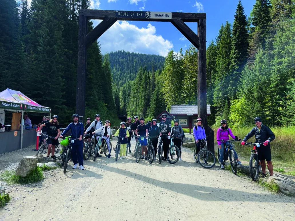 Cultural Integration Program participants with bicycles at the Route of the Hiawatha trail.